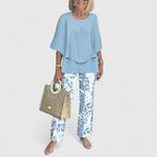 Women's two-piece pant set with relaxed fit top and wide leg pants, casual coordinated outfit