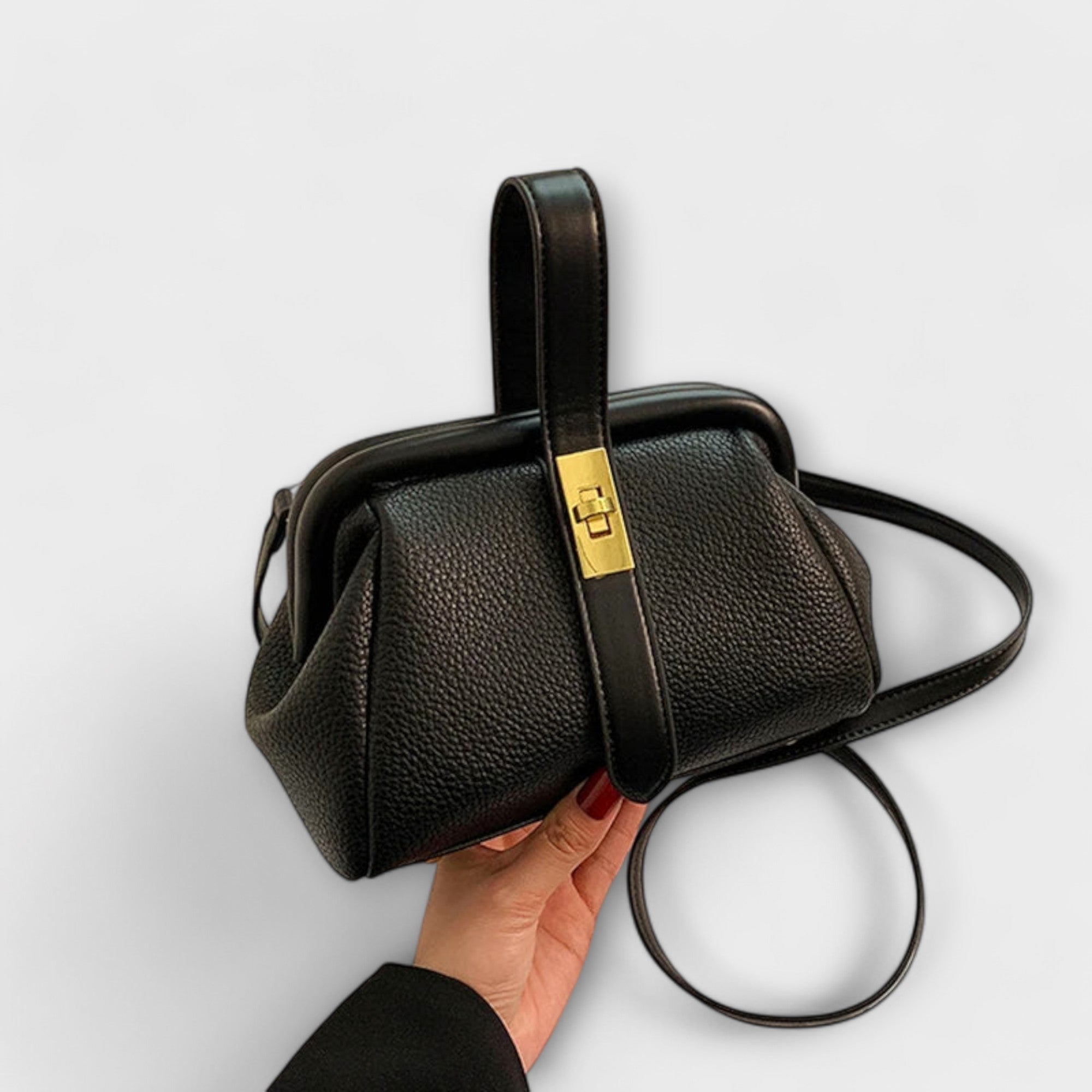Women mini crossbody bag with twist lock closure in faux leather