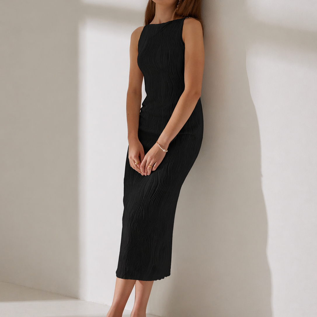 Sleeveless fitted midi dress with subtle ripple texture, available in white and black