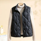 Women's quilted puffer vest with stand collar, sleeveless design, sizes M to 4XL