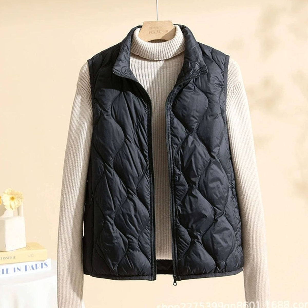 Women's quilted puffer vest with stand collar, sleeveless design, sizes M to 4XL