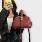 Women mini crossbody bag with twist lock closure in faux leather