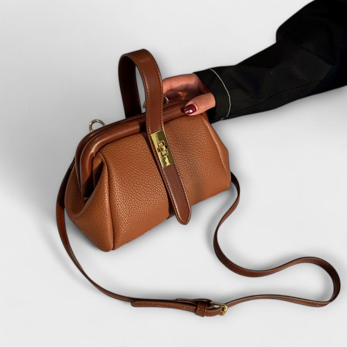 Women mini crossbody bag with twist lock closure in faux leather