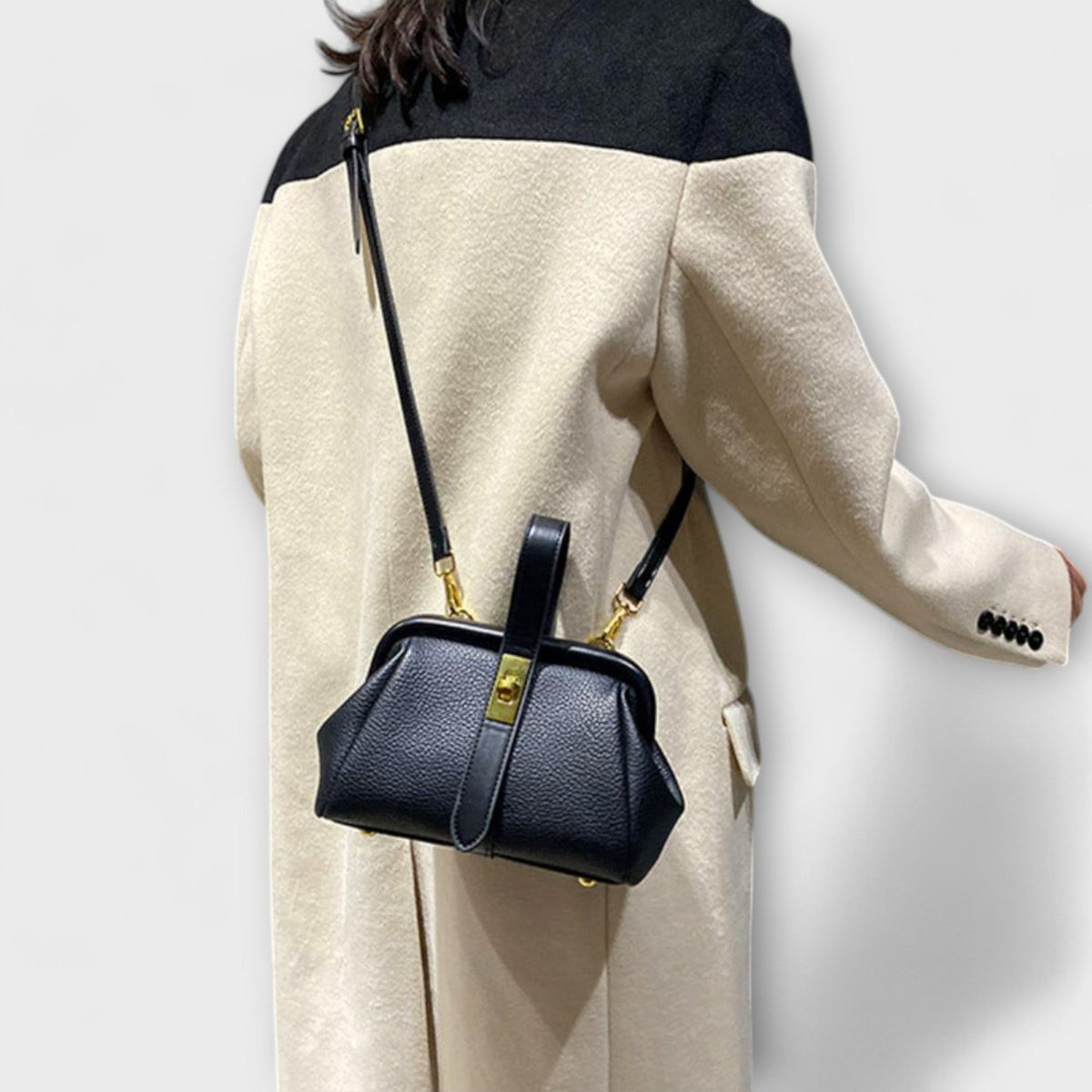 Women mini crossbody bag with twist lock closure in faux leather