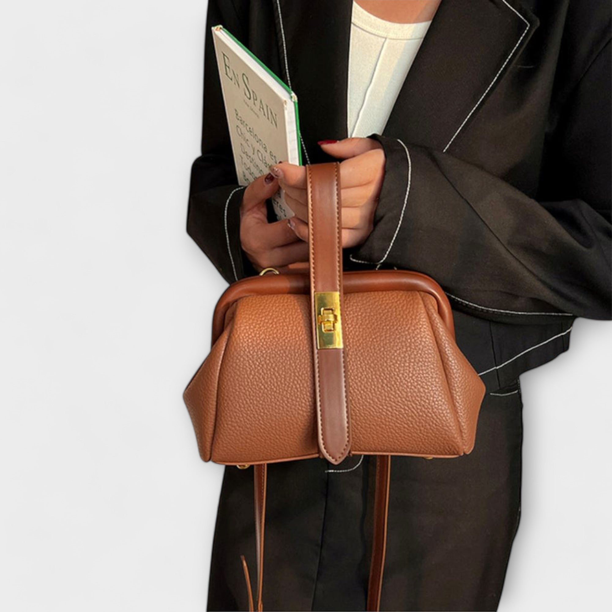 Women mini crossbody bag with twist lock closure in faux leather