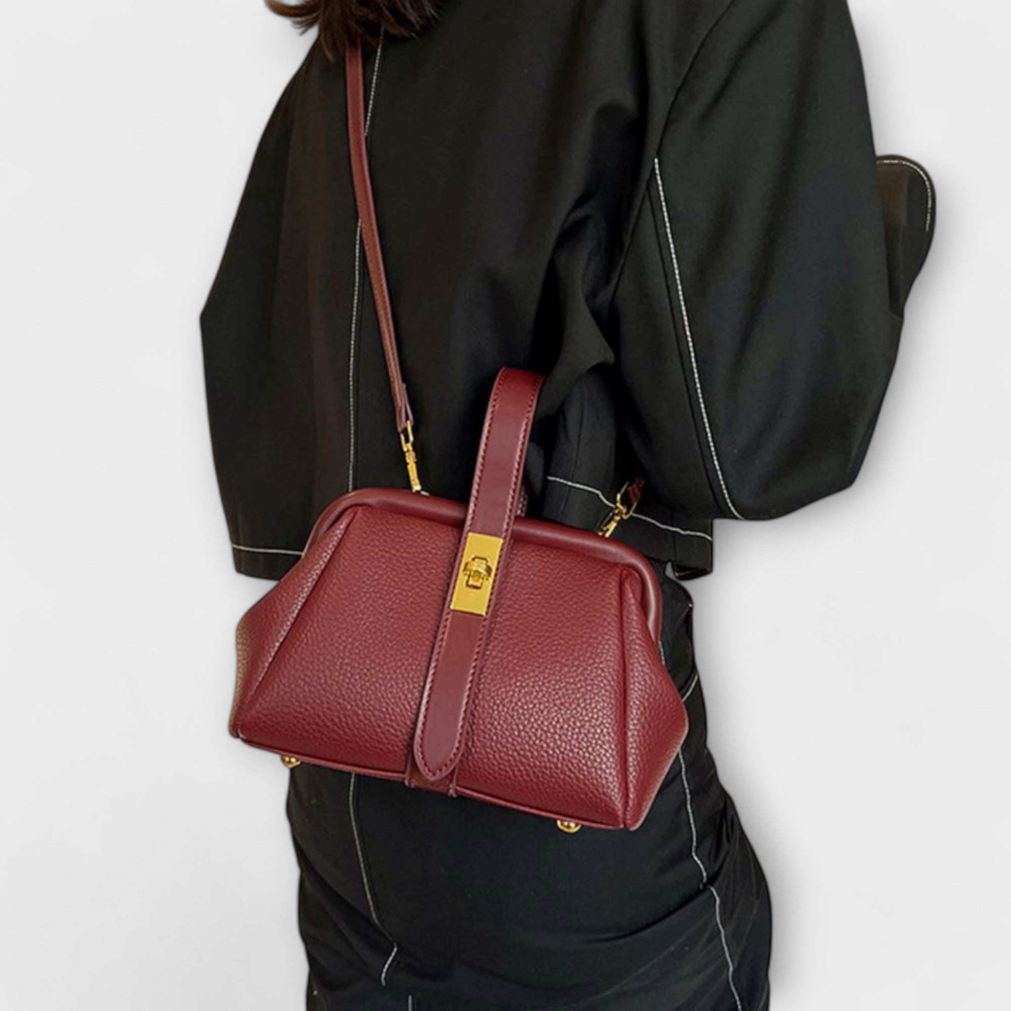 Women mini crossbody bag with twist lock closure in faux leather