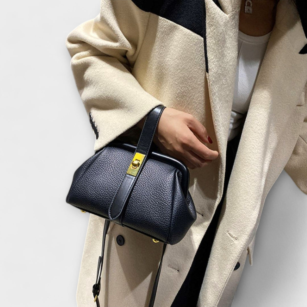 Women mini crossbody bag with twist lock closure in faux leather