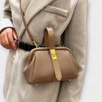 Women mini crossbody bag with twist lock closure in faux leather