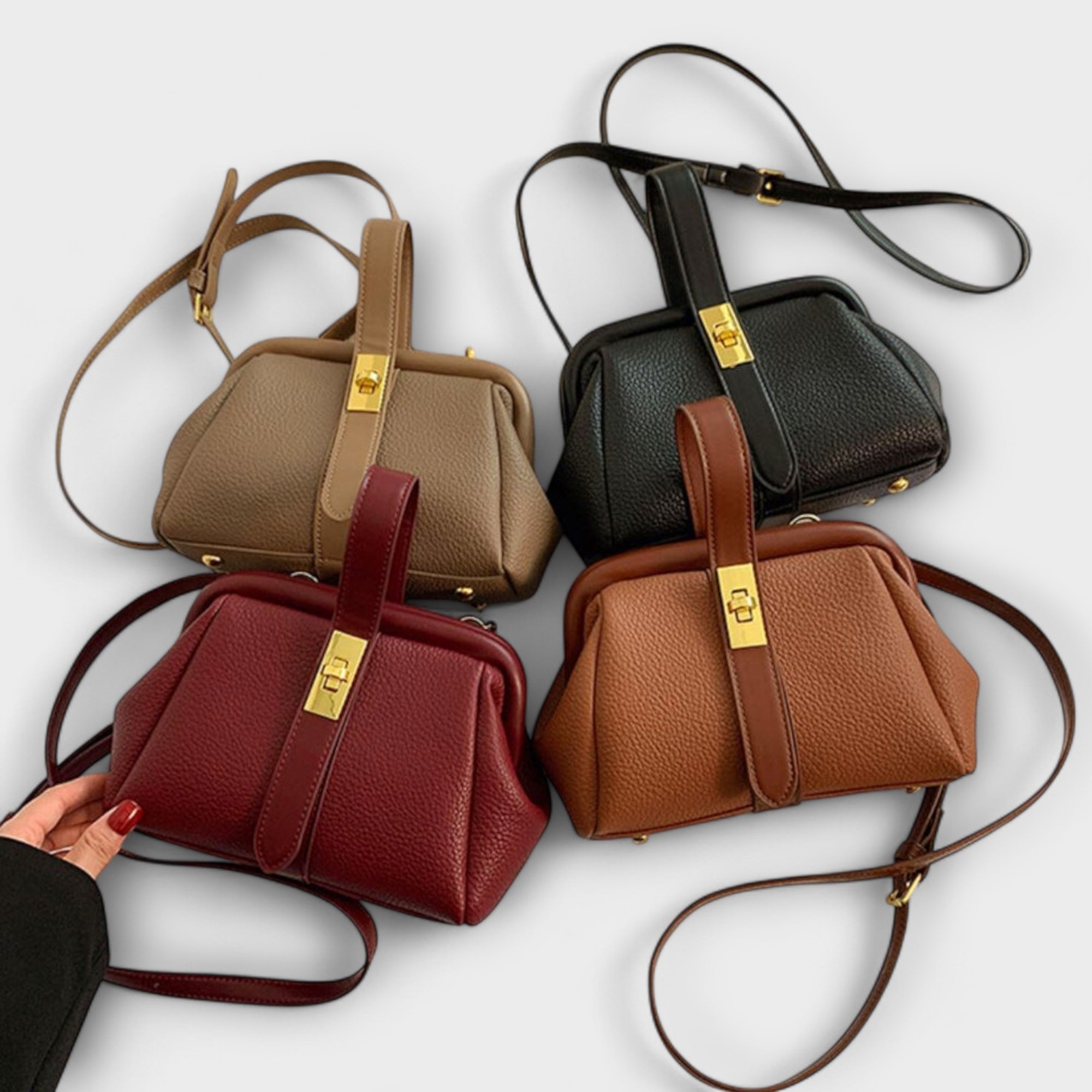 Women mini crossbody bag with twist lock closure in faux leather