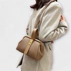 Women mini crossbody bag with twist lock closure in faux leather