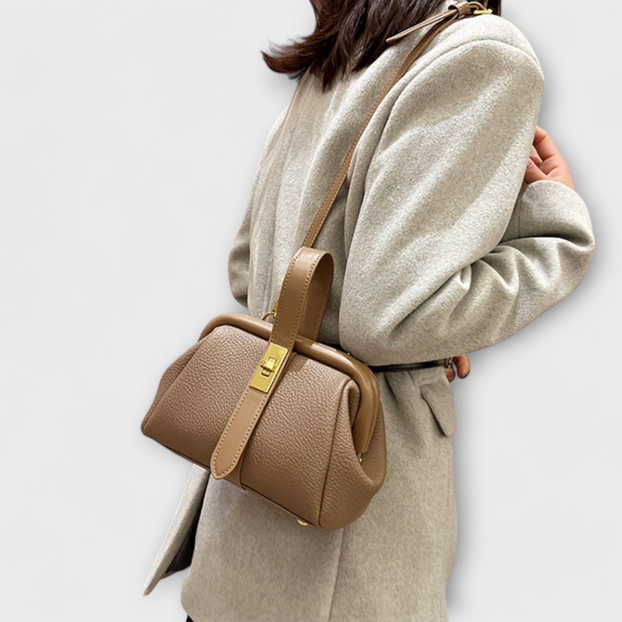 Women mini crossbody bag with twist lock closure in faux leather
