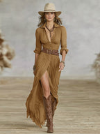 Women's long belted dress with pleated lapels and waist-defining adjustable belt