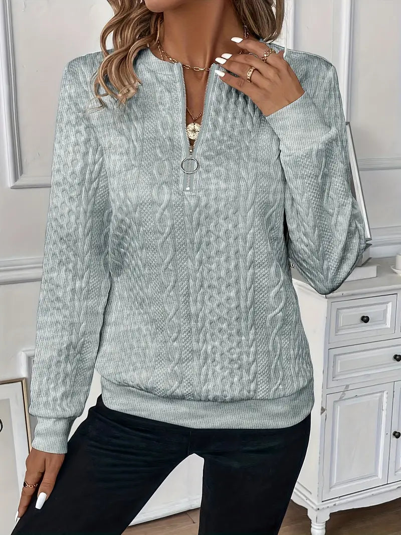 Women's soft knit sweater in versatile everyday style, feminine cut