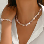 Women fishtail necklace with glass rhinestones in rose gold and silver