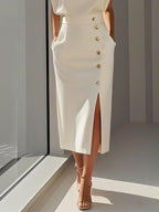 Women's structured midi dress with round neckline and button slit detail
