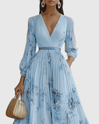 Women's sleeveless A-Line midi dress with floral print and belted waist