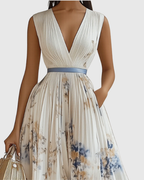 Women's sleeveless A-Line midi dress with floral print and belted waist