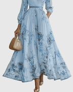 Women's sleeveless A-Line midi dress with floral print and belted waist