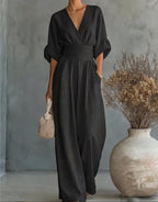 Women's wide-leg jumpsuit with V-neck and belted waist, elegant occasion wear