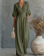Women's wide-leg jumpsuit with V-neck and belted waist, elegant occasion wear