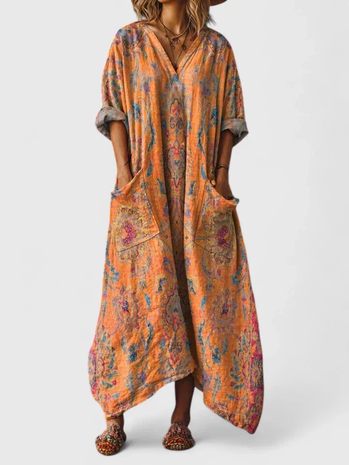 Women's boho maxi dress with paisley print and front pockets, loose cotton fit