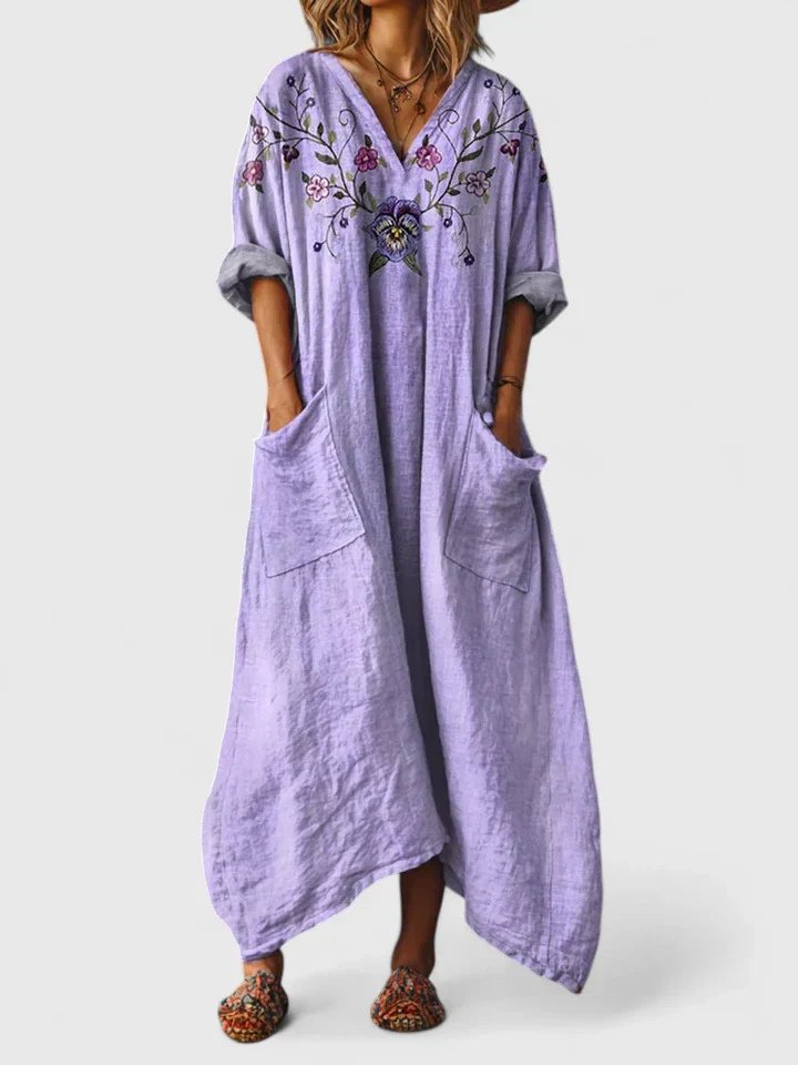 Women's boho maxi dress with paisley print and front pockets, loose cotton fit