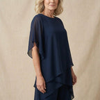 Women's chiffon two-piece set with wide-leg pants and elegant layered top