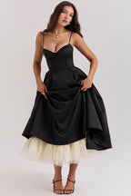 Women's midi cocktail dress with swing skirt and built-in underwire cups