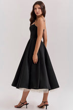 Women's midi cocktail dress with swing skirt and built-in underwire cups