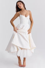 Women's midi cocktail dress with swing skirt and built-in underwire cups