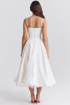 Women's midi cocktail dress with swing skirt and built-in underwire cups