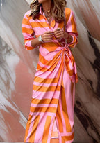 Women's long sleeve striped wrap dress with V-neckline and midi length