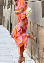Women's long sleeve striped wrap dress with V-neckline and midi length