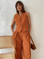 Women's linen two-piece set with wide-leg pleated trousers and button-up vest, summer