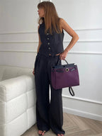 Women's linen two-piece set with wide-leg pleated trousers and button-up vest, summer