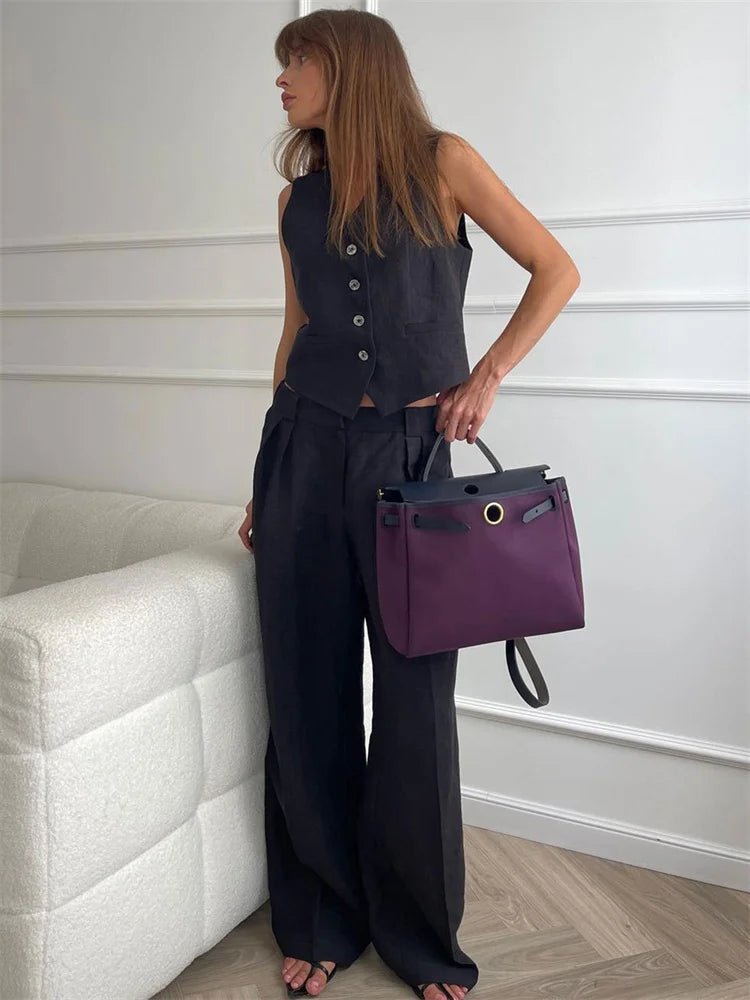 Women's linen two-piece set with wide-leg pleated trousers and button-up vest, summer