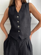 Women's linen two-piece set with wide-leg pleated trousers and button-up vest, summer