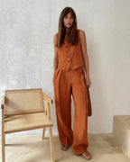 Women's linen two-piece set with wide-leg pleated trousers and button-up vest, summer