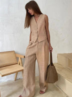 Women's linen two-piece set with wide-leg pleated trousers and button-up vest, summer