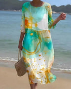 Women's midi summer dress with floral print and 3/4 sleeves, flowing fit