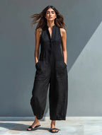 Women's sleeveless linen jumpsuit with stand collar and button-up front, relaxed fit
