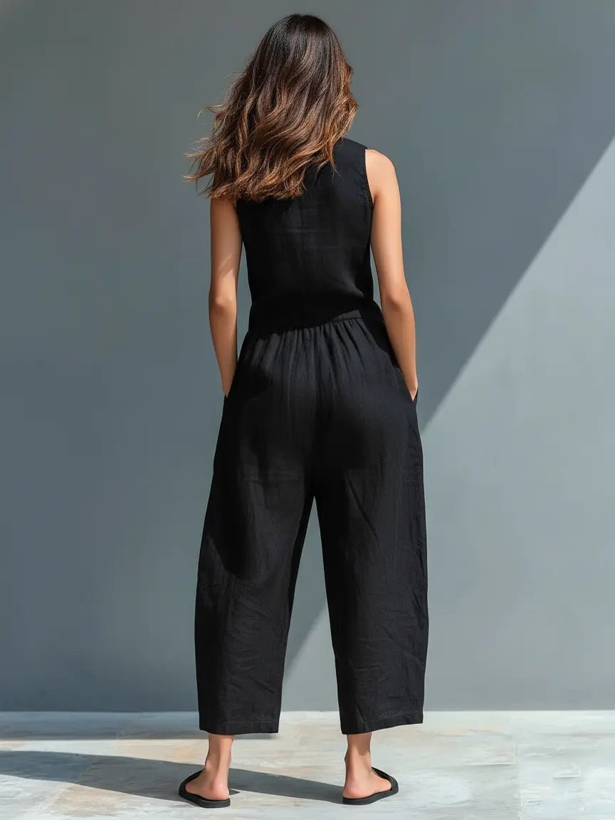 Women's sleeveless linen jumpsuit with stand collar and button-up front, relaxed fit