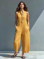 Women's sleeveless linen jumpsuit with stand collar and button-up front, relaxed fit