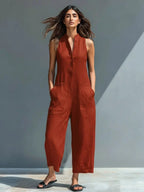 Women's sleeveless linen jumpsuit with stand collar and button-up front, relaxed fit
