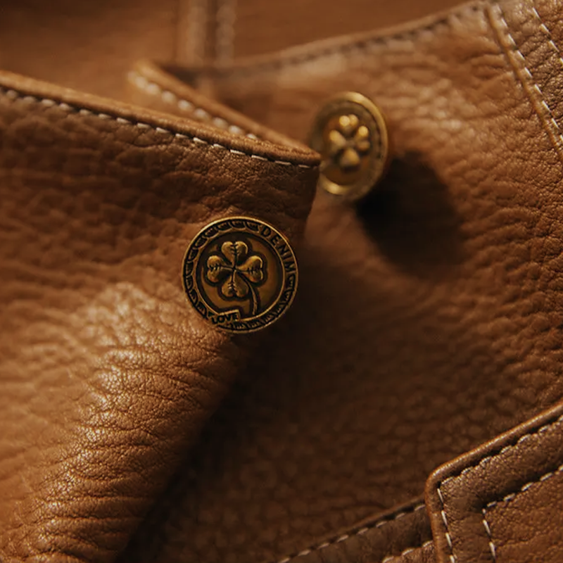Women leather jacket with distinctive collar and pockets button closure