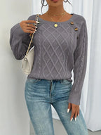 Women's winter cable knit pullover sweater with decorative button detail