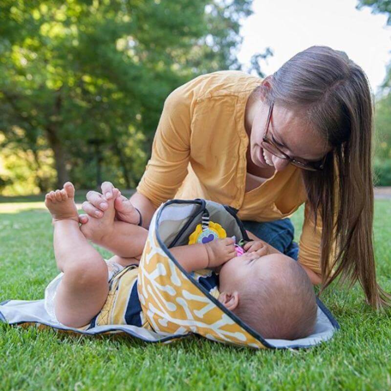 Baby changing mat with toy holder and side barriers, waterproof foldable, 0–24 months