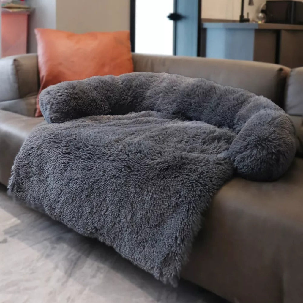 Anti-anxiety calming dog sofa bed with raised bolster sides faux fur surface