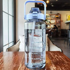 2L sport water bottle with straw and time markers, BPA-free, blue