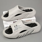 Unisex massage slippers with orthopedic arch support and non-slip cushioned sole